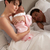 Mother Cuddling Newborn Baby In Bed At Home stock photo © monkey_business