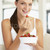 Young Woman Eating A Bowl Of Fresh Strawberries stock photo © monkey_business