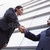 dwa · biznesmenów · drżenie · rąk · na · zewnątrz · biurowiec · ludzi · biznesu - zdjęcia stock © monkey_business
