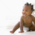 Baby crawling indoors smiling stock photo © monkey_business