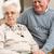 Senior Couple Sitting In Hospital,Looking Serious stock photo © monkey_business