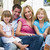 Family sitting on patio smiling stock photo © monkey_business