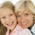 Grandmother and granddaughter smiling stock photo © monkey_business