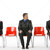 tre · uomini · d'affari · seduta · rosso · plastica · business - foto d'archivio © monkey_business