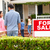 Hispanic family outside home with for sale sign stock photo © monkey_business