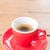 Fresh brewed hot espresso in red cup stock photo © nalinratphi