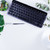 Büro · zu · Hause · Arbeitsplatz · schwarz · Tastatur · grüne · Blätter · weiß - stock foto © neirfy