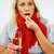 Sick young blond woman with pills and glass of water stock photo © Nejron