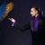 Young handsome brunette magician man in stage costume with his trained parrot stock photo © Nejron