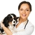 Young positive brunette veterinary woman with spaniel  stock photo © Nejron