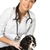 Young positive brunette veterinary woman holding spaniel with wounded leg  stock photo © Nejron