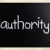 'Authority' handwritten with white chalk on a blackboard stock photo © nenovbrothers