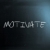 'Motivate' handwritten with white chalk on a blackboard stock photo © nenovbrothers