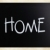 'Home' handwritten with white chalk on a blackboard stock photo © nenovbrothers