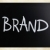 'Brand' handwritten with white chalk on a blackboard stock photo © nenovbrothers