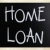 'Home loan' handwritten with white chalk on a blackboard stock photo © nenovbrothers