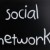 The word 'Social network' handwritten with white chalk on a blac stock photo © nenovbrothers