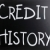 'Credit history' handwritten with white chalk on a blackboard stock photo © nenovbrothers