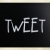 'Tweet' handwritten with white chalk on a blackboard stock photo © nenovbrothers