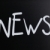 The word 'News' handwritten with white chalk on a blackboard stock photo © nenovbrothers