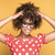 African american girl in eyeglasses on yellow background. stock photo © NeonShot