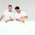 kettő · srácok · pózol · fehér · üres · tábla - stock fotó © NeonShot