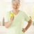 Healthy elderly woman holding apple stock photo © nyul