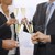 Business people raising toast with champagne stock photo © nyul