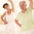 Elderly woman with personal fitness trainer stock photo © nyul