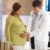 arts · onderzoeken · zwangere · vrouw · aanraken · zwangere · buik - stockfoto © nyul
