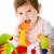 boldog · baba · játszik · kislány · játék · bohóc - stock fotó © nyul