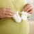 Pregnant woman with baby shoes stock photo © nyul