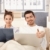 Happy couple browsing internet in bed at home stock photo © nyul