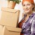 Smiling woman with boxes stock photo © nyul