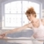 Ballerina girl stretching by bar in studio stock photo © nyul