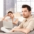 Young couple sitting on sofa at home stock photo © nyul