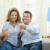 Excited couple watching TV stock photo © nyul