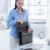 Businesswoman packing out briefcase in office stock photo © nyul