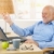 Laughing old man using laptop stock photo © nyul
