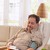 Old man measuring blood pressure at home stock photo © nyul