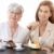 grootmoeder · kleindochter · koffie · vergadering · tabel · coffeeshop - stockfoto © nyul