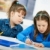 Schoolgirls learning in classroom stock photo © nyul