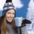 Nice girl drinking hot tea in ski resort smiling stock photo © nyul