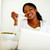 uśmiechnięta · kobieta · Internetu · jedzenie · Sałatka · portret · laptop - zdjęcia stock © pablocalvog