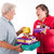 senior and mental disabled woman holding presents stock photo © Pasiphae