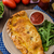 Calzone pizza stuffed with cheese and prosciutto stock photo © Peteer