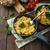 Scrambled eggs with herbs and homemade bread stock photo © Peteer