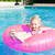 little girl with rubber ring in swimming pool stock photo © phbcz