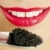 szczegół · kobieta · czarny · kawior · usta · zęby - zdjęcia stock © phbcz