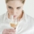 portrait of young woman tasting white wine stock photo © phbcz